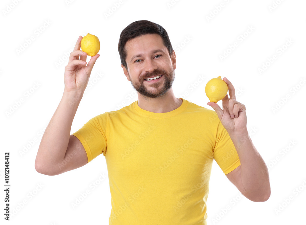 Poster Happy man holding lemons on white background