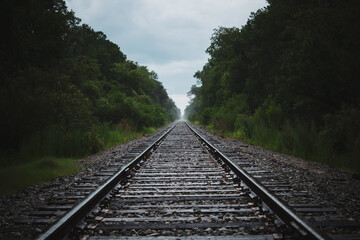 Obraz premium railroad at dawn, fog on the railroad, empty railroad