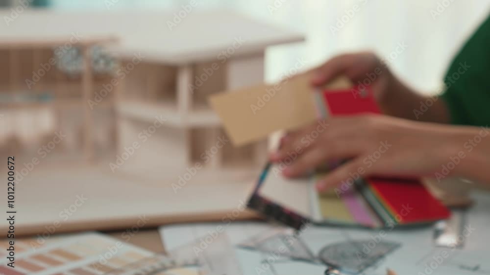 Poster slow motion interior designer using architectural equipment draw a blueprint while interior designer
