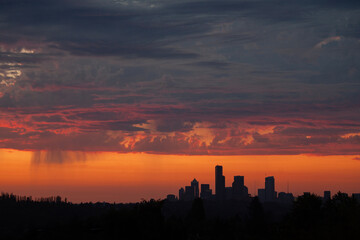 SEATTLE, WASH., U.S. - JULY 12, 2012: The sun sets in dramatic fashion over Seattle, Wash., viewed from the Seward Park neighborhood on July 12, 2012.