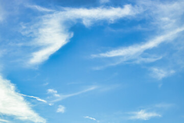A beautiful sky tinted by the sun leaving vibrant shades of gold, pink, blue and multicolored. Clouds in the twilight evening and morning sky. Cloudy sky background in the evening, and during the day.