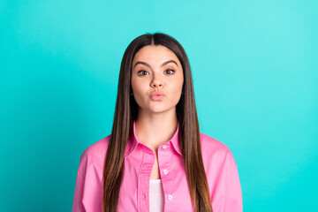 Fototapeta premium Photo portrait of attractive teen woman kissing pouted lips dressed stylish pink clothes cyan on blue color background