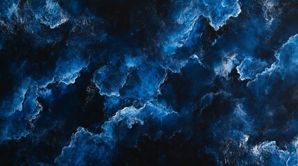 An abstract, dark blue background with a subtle black texture that adds depth and interest. The deep blue hue creates a sense of mystery and intrigue