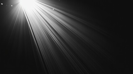 Fototapeta premium Sun rays overlay isolated on a black background, ideal for overlay designs. Special lens light effect creates an abstract lens flare light over a black background. 
