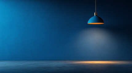 A blue wall with a light shining on it