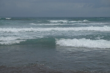Abstract shapes, patterns and textures of sea waves. Big waves heading towards the beach.For graphic design or banner background