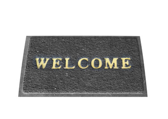 Doormat with welcome sign on white background. This has clipping path.
