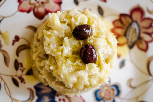 The "Brandacuiun"is a tipical dish of the fishermen tradition in liguria, italy. Made with stockfish, olives and potatoes can be served at the start like as a main course.