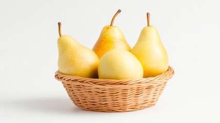Four ripe yellow pears in wicker basket against white background. pears look fresh and delicious, perfect for healthy snack.