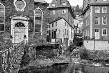 Architecture in the small romantic Eifel town of Monschau, near the national park in the North Eifel, monochrome.