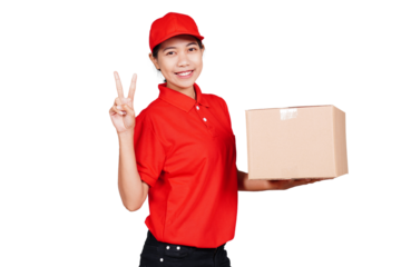 Smiling asian delivery courier woman holding boxed packages and showing peace hand sign gesture isolated transparent