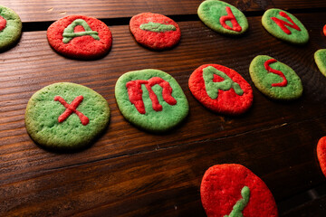 Festive homemade green and red Christmas letter cookies, Xmas