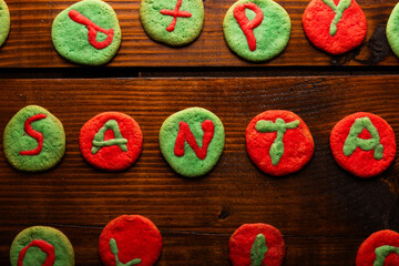 Festive homemade green and red Christmas letter cookies, Santa