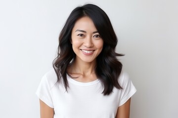 Portrait of a beautiful asian woman smiling and looking at camera