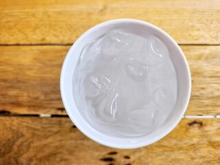 Drinking water and ice in a glass