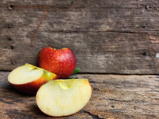 Ripe apple on wood background