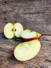 Ripe apple on wood background