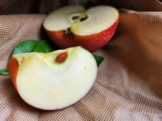 Ripe apple on wood background
