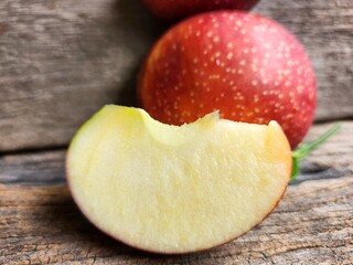 Ripe apple on wood background