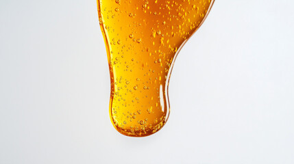 close-up, front view, the image of honey dripping on a white background