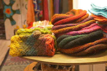 A Beautiful Array of Colorful Wool Scarves and Accessories Artistically Displayed for Everyone