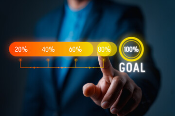 Business person touches a progress bar showing percentages from 20% to 100%, symbolizing goal...