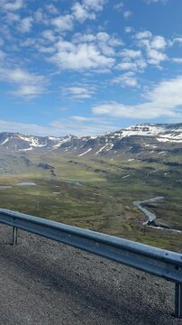 Driving ontop of a mountain in Iceland looking out 