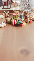 クリスマスプレゼントとかわいいトナカイ　クリスマスのイメージ写真　クリスマスカード　クリスマス背景