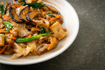 stir-fried noodles with tofu and vegetables