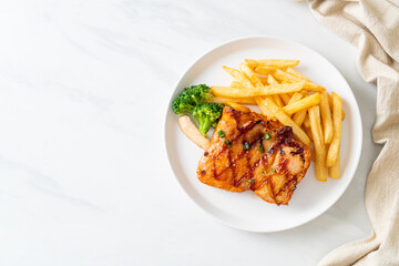 grilled chicken steak with potato chips or french fries