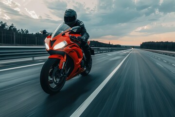 Motorcyclist makes a turn in front of camera