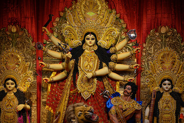 Idol of Goddess Devi Durga in a beautifully decorated pandal during the Durga Puja festival of Hinduism in Kolkata, West Bengal, India