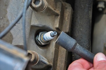 car spark plug in engine close up
