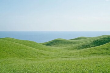 Obraz premium A vast grassland with undulating hills of green grass 
