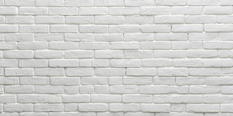 Obraz premium A pristine white brick wall, a canvas of smooth, uniformly painted surface, ready for an artistic expression