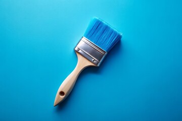 Blue Paintbrush on Vibrant Blue Background for Artistic Creations and Design Projects in Home Decor and Crafting