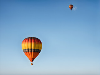 Fototapeta premium hot air balloon floating in the blue sky