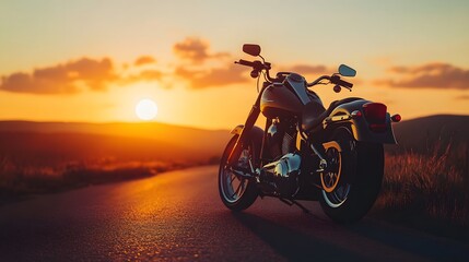 A motorcycle parked on the right side of the road during sunset, with a blurred background creating a peaceful atmosphere