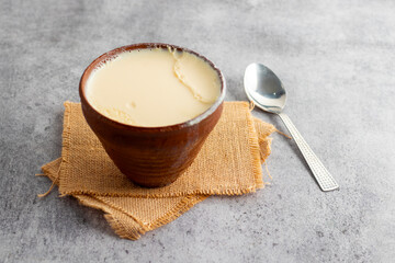 Misti doi is a traditional Bengali sweet yogurt made by caramelizing milk and sugar, known for its...