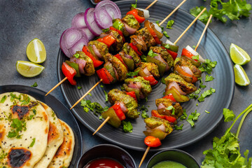 Selective focus of Succulent Hariyali Chicken Tikka Kabab, A Flavorful Blend of Herbs, Spices, and Grilled to Perfection