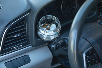 Stack of coins with a car.
