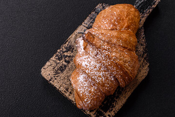 Delicious crispy sweet croissant with chocolate