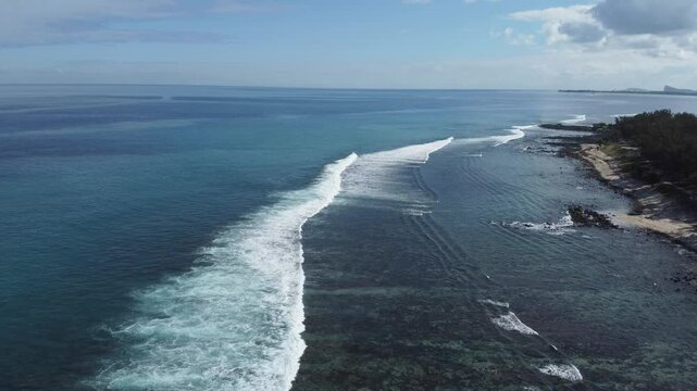 Aerial view in Mauritius over Pointe aux Piments beach, a beautiful tropical beach in the Indian Ocean