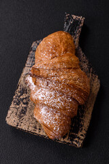 Delicious crispy sweet croissant with chocolate