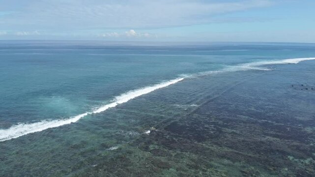 Aerial view in Mauritius over Pointe aux Piments beach, a beautiful tropical beach in the Indian Ocean