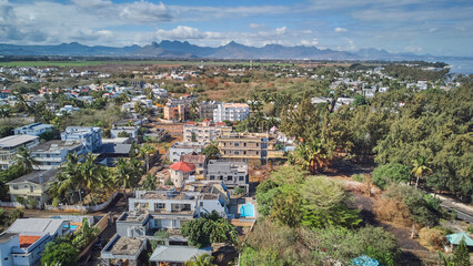 Fototapeta premium Aerial view in Mauritius over Pointe aux Piments, a beautiful quite area in the Indian Ocean, Africa