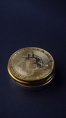 Golden bitcoin or BTC cryptocurrency, Focus selected, dark background