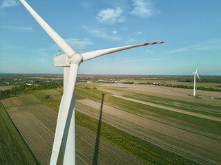 Wind turbine generating electricity at dusk