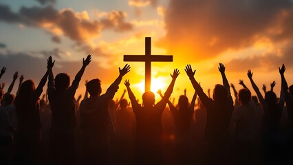 A group of people with raised hands in front of a large cross at sunset, symbolizing unity and worship