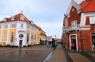 ancient corner pharmacy in the historic center of skagen city in northern denmark after the rain